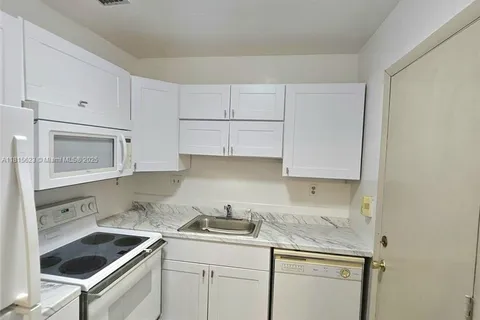 3020 NE 16th Ave # 103, Oakland Park FL 33334