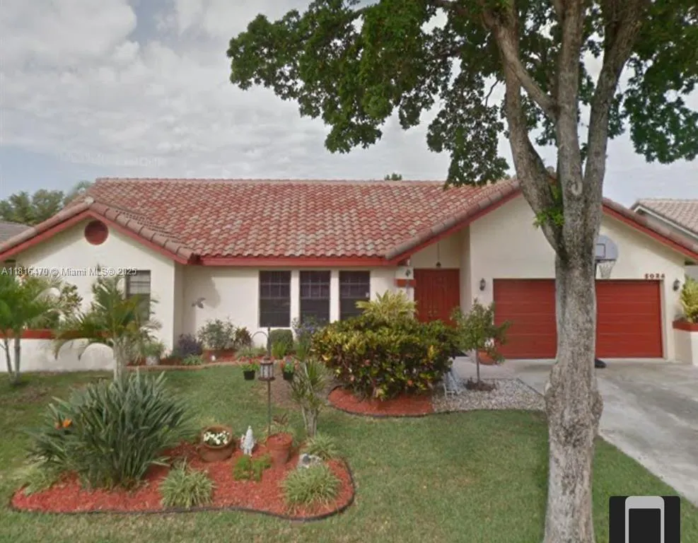 5024 NW 58th Ter, Coral Springs FL 33067