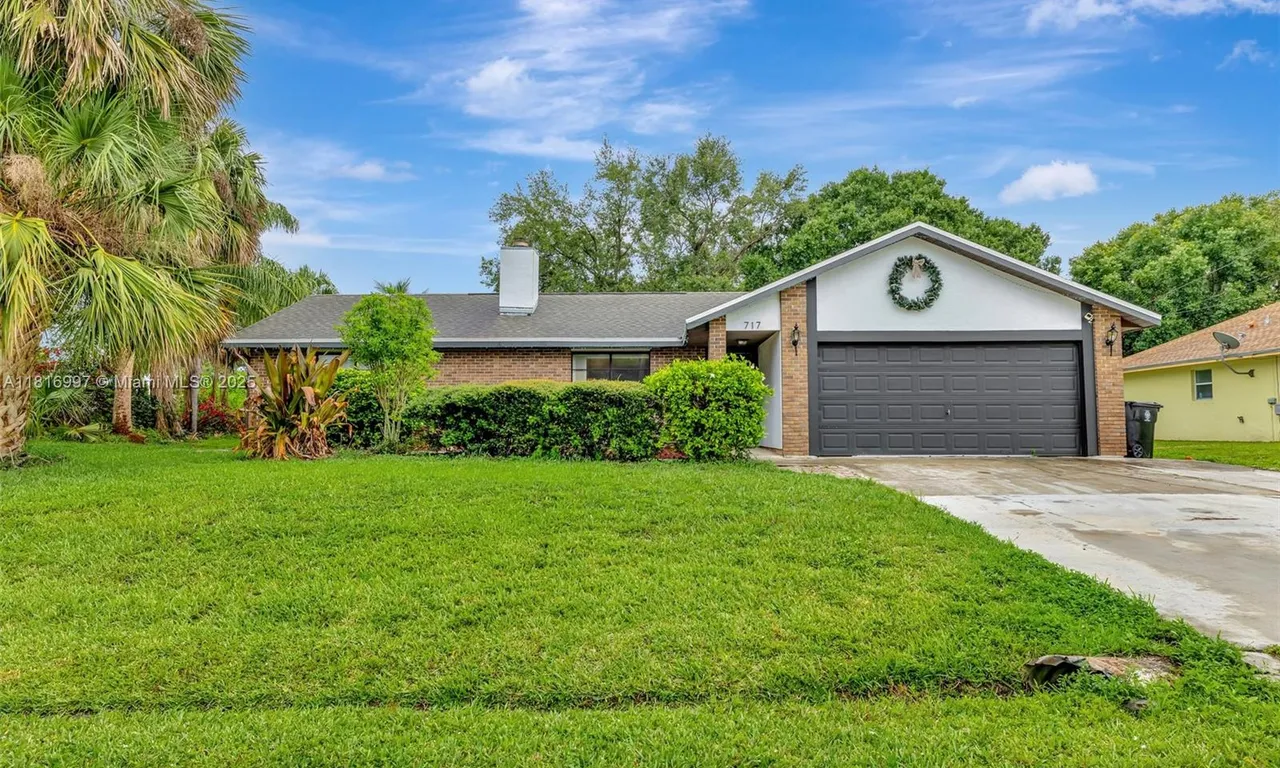 717 SW Aster Rd, Port St. Lucie FL 34953