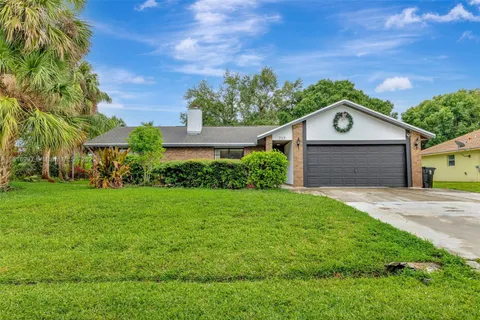 717 SW Aster Rd, Port St. Lucie FL 34953