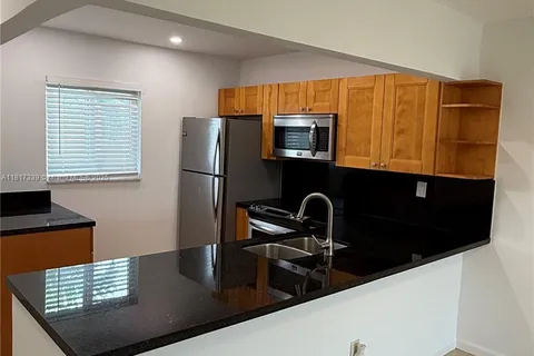 7700 Camino Real # D402, Miami FL 33143