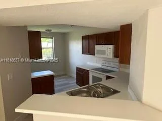 8741 Wiles Rd # 208, Coral Springs FL 33067