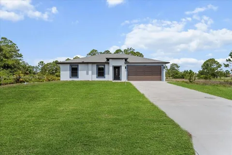 1032 MAXWELL AVE S, Lehigh Acres FL 33974