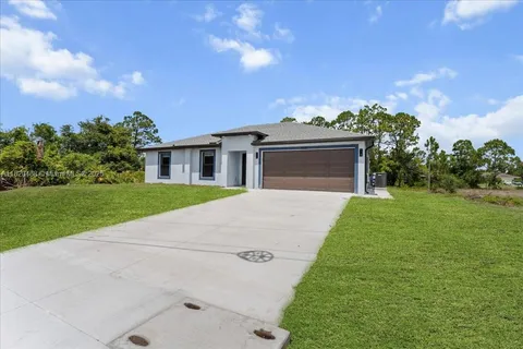 1032 MAXWELL AVE S, Lehigh Acres FL 33974