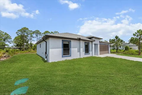 1032 MAXWELL AVE S, Lehigh Acres FL 33974