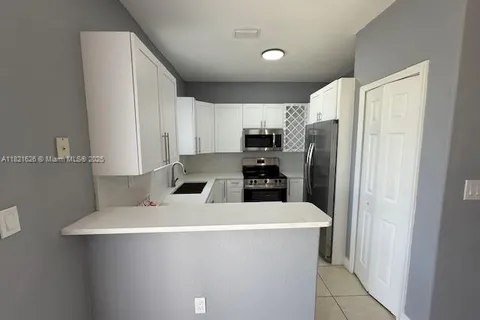 7337  nw 174  th ter # 107, Miami Lakes FL 33015
