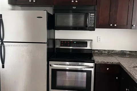 498 NW 165th St Rd # D303, Miami FL 33169