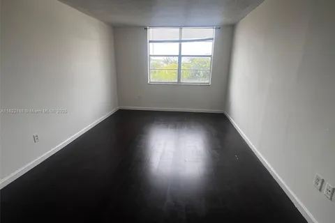 498 NW 165th St Rd # D303, Miami FL 33169