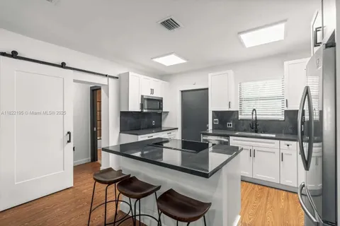 1121 NW 57th St, Miami FL 33127