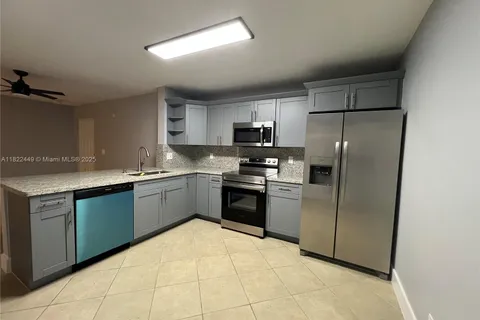 5761 Riverside Dr, Coral Springs FL 33067