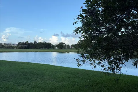 566 VILLAGE LAKE DRIVE, Weston FL 33326