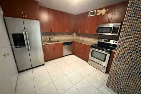 401 Golden Isles Dr # 202, Hallandale Beach FL 33009