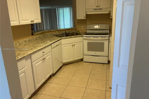 3453 NW 44th St # 202, Oakland Park FL 33309