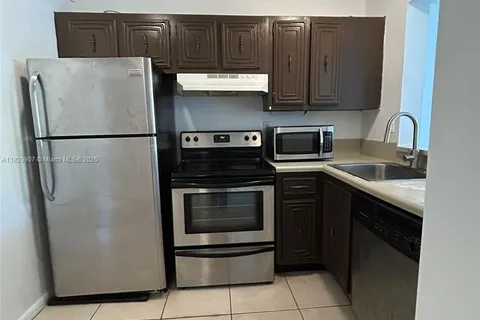 496 NW 165th St Rd # 310, Miami FL 33169