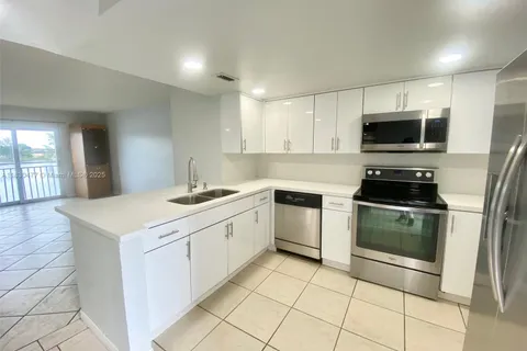 9911 W Okeechobee Rd # 402, Hialeah Gardens FL 33016