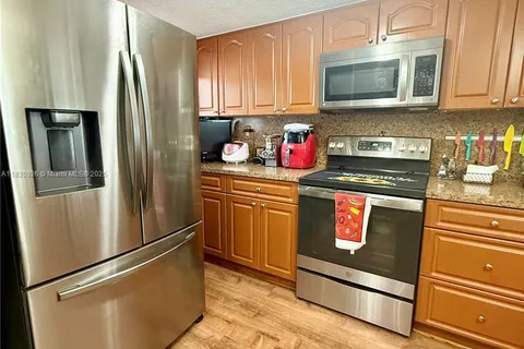 9917 W Okeechobee Rd # 201, Hialeah Gardens FL 33016