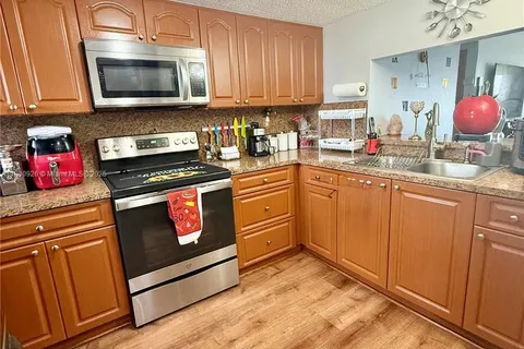 9917 W Okeechobee Rd # 201, Hialeah Gardens FL 33016
