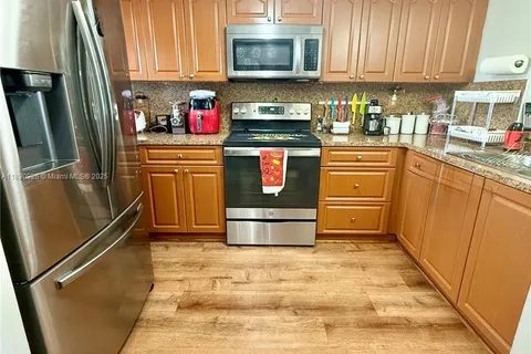 9917 W Okeechobee Rd # 201, Hialeah Gardens FL 33016