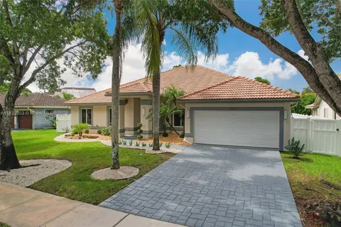 10077 N Springs Way, Coral Springs FL 33076