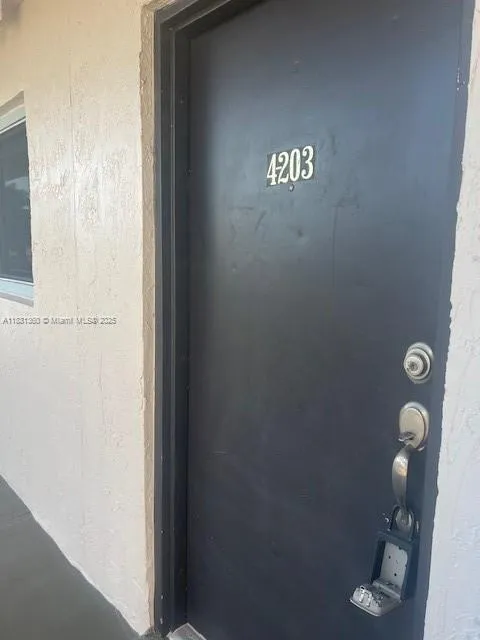 9917 W Okeechobee Rd # 203, Hialeah Gardens FL 33016