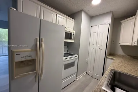 1251 N Benoist Farms Rd # 205, West Palm Beach FL 33411