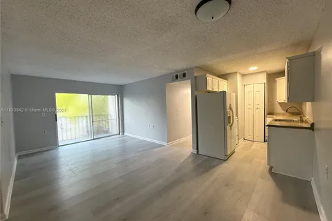 1251 N Benoist Farms Rd # 205, West Palm Beach FL 33411