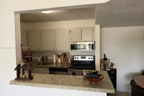 7180 NW 179th St # 202, Hialeah FL 33015