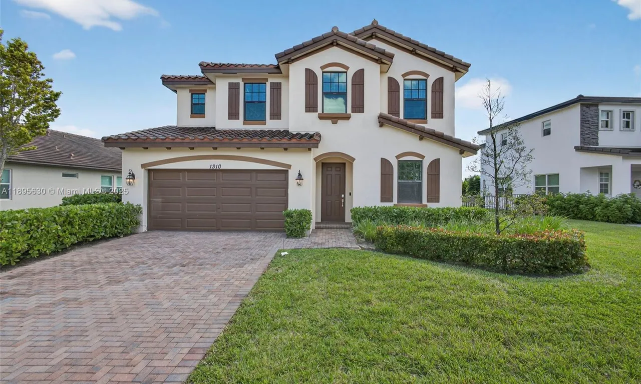 1310 Whitcombe Dr, Royal Palm Beach FL 33411