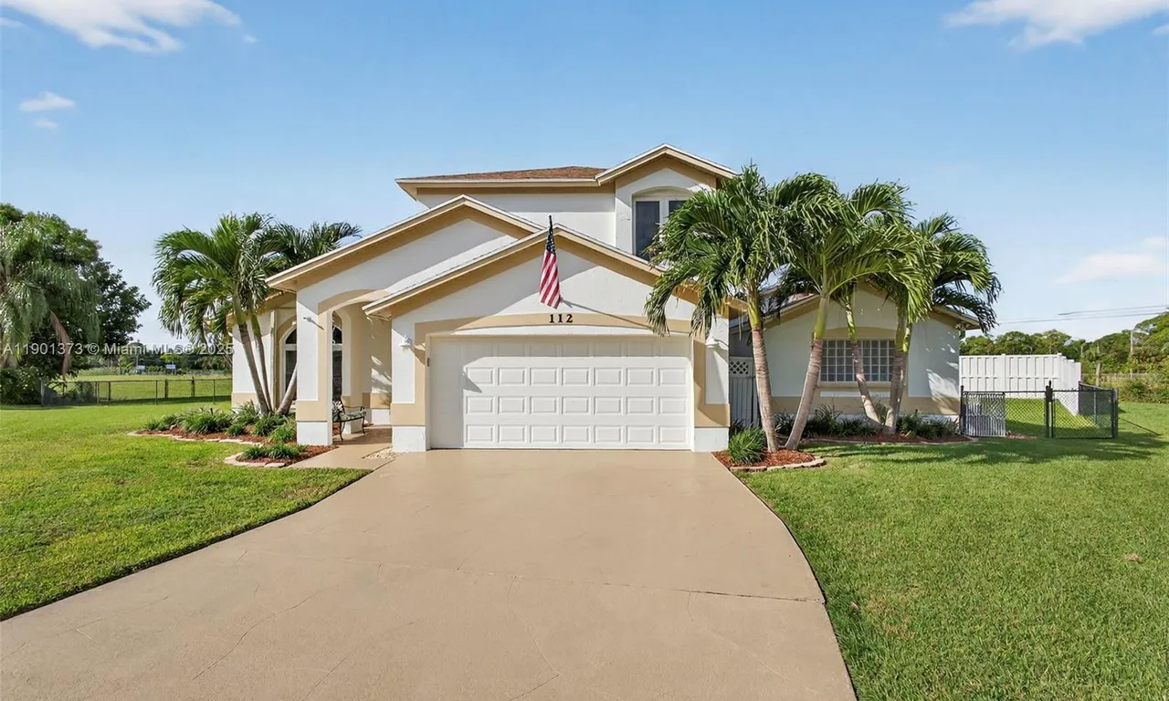 112 Camelot Ct, Royal Palm Beach FL 33411