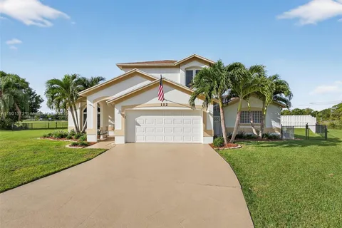 112 Camelot Ct, Royal Palm Beach FL 33411