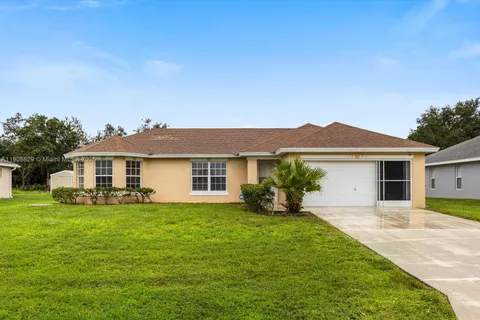 1392 SW Sudder Ave, Port St. Lucie FL 34953