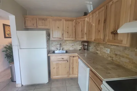 5851 NW 62nd Ave # 202, Tamarac FL 33319